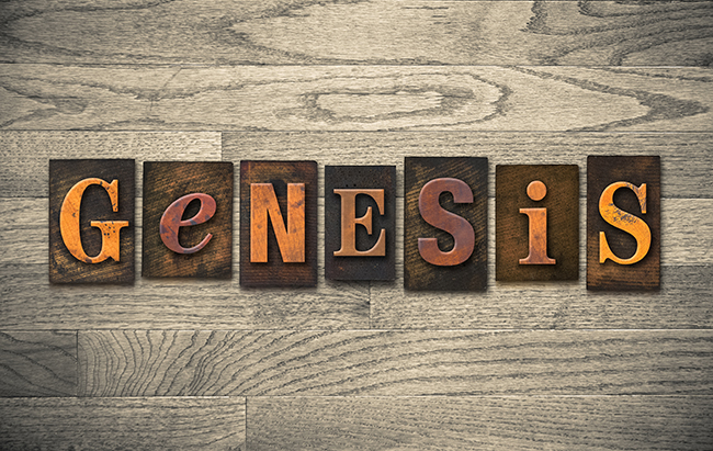 The word "GENESIS" written in vintage wooden letterpress type.